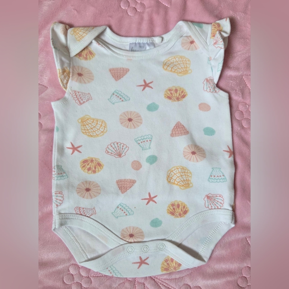 Seashell Print Baby Bodysuit in Cream by [Brand]